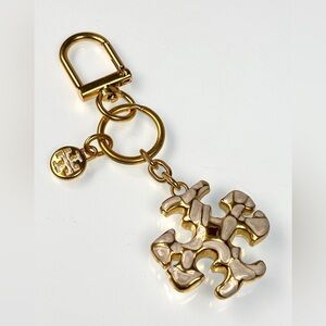 Tory Burch Gold metal and Cream Pearl bag charm Keychain. Key fob